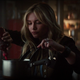 Yelena douses her mac and cheese in red-capped sriracha